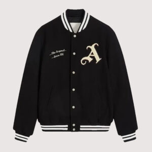 Anne Hathaway wearing Arsenal Gunners jacket in stylish red fan apparel street look